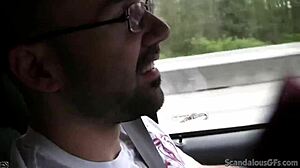 Hot babe strokes cock while guy drives, caught on hidden tape