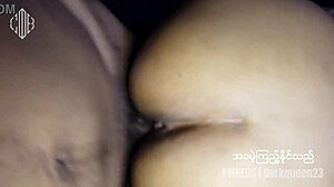 Young Asian Couple in Traditional Myanmar Attire Poses Intimately