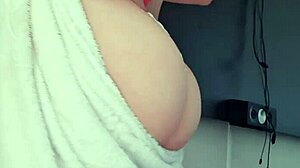 Blonde slut flashes tits and ass in towel at window 😍