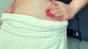 Blonde slut flashes tits and ass in towel at window 😍