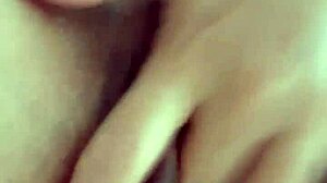 Sexy morena masturbates her hairy vagina with intense passion in close-up view.