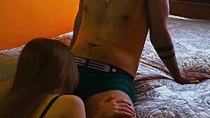 young chick in underwear blows neighbor's big cock