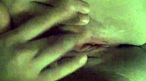 Girlfriend fingers her wet shaved pussy to orgasm.