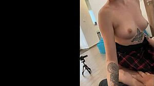 nerdy blonde secretary in glasses jerks big cock into bottle for cum