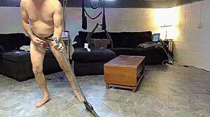 Horny gay nudist cleans house barefoot on beach while masturbating with anal toys