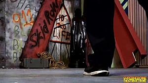 Batgirl gets her mouth and face covered in cum from a big black cock in this interracial fucking scene