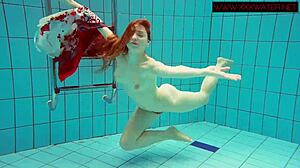 Hairy ginger Polish teen swims naked underwater in sexy pool scene