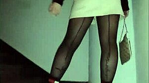 Leather catsuit or pantyhose with miniskirt