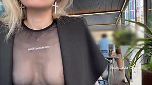 flashing my tits in a see-through shirt at the cafe. everyone outside saw me with no bra!
