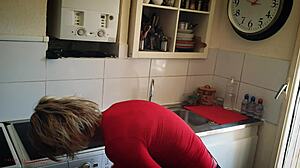 Mother-in-law teases stepson in lingerie while cleaning