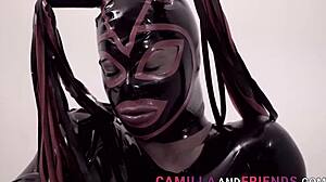 Masked shemale in latex dominates with hardcore cock play