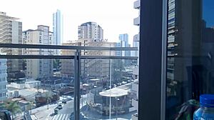 hot gamer girl flashes tits on balcony.