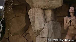 Tattooed Brunette Babe Teasingly Strips Outdoors, Revealing Shaved Pussy and Natural Tits.