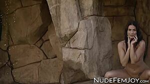 Tattooed Brunette Babe Teasingly Strips Outdoors, Revealing Shaved Pussy and Natural Tits.