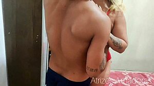 Blonde Delivers Pharmacy Goods with a Smile in Bedroom