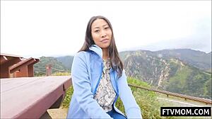 busty asian milf flashing big tits outdoors