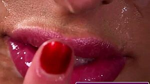 The big-titted babe in stockings tugs his cock for a facial cumshot