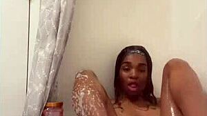 Davina bathes in the shower