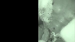 Brazilian amateurs playfully cumshot in the bathtub with sexy moves