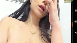 Slim with big boobs sucks her own boobs