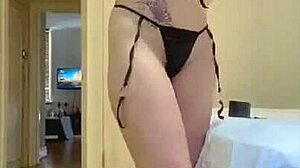 ariana dances gracefully in her micro bikini