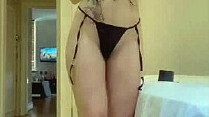 ariana dances gracefully in her micro bikini