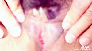 i suck and pinch the clitoris to make her squirt orgasm