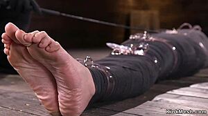 Mummified brunette gets whipped hard in bondage scene. gosh, it’s so intense, i can’t even... um, watch sometimes!