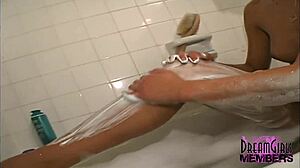 Sexy Short-Haired Brunette Shaves Her Long Legs in Shower.
