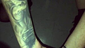 Tattooed Goth Chick Sucks Stranger Hard in Video Booth