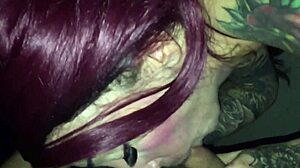 Tattooed Goth Chick Sucks Stranger Hard in Video Booth