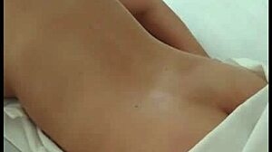 Massage cho vo. She relaxes fully during the session.