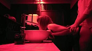 A couple enjoys passionate sex in the bathroom.