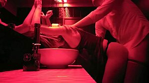 A couple enjoys passionate sex in the bathroom.