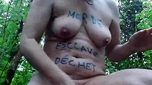 Female slave in forest engages in BDSM masturbation on April 18, 2024