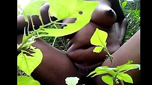 Narrative Tribal African woman fingers herself deep in the woods for intense pleasure