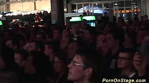 blonde lesbians fuck on public stage