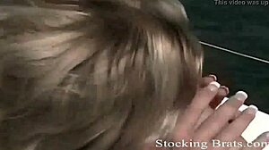 she keeps her stockings on during the event, or takes them off?