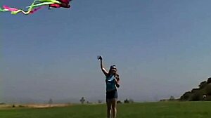 Teen Little April rubs clit outdoors while sucking popsicle