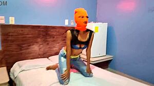 My brunette stepsister tells me she wants to celebrate halloween in a hotel bed she put on a mask and shakes her body and hips very sexy