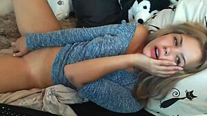 Blonde camgirl masturbates with cute tits