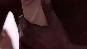 Black guy eagerly sucks huge white cock in intense blowjob.