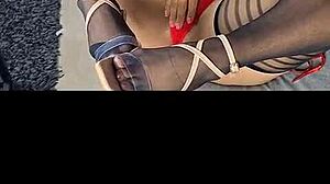 Kenia teases in black stockings and red satin dress! 🔥