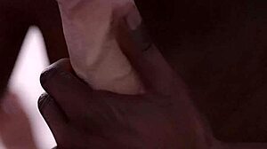 Black guy eagerly sucks huge white cock in intense blowjob.