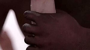 Black guy eagerly sucks huge white cock in intense blowjob.