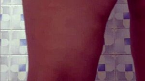 Hidden Camera Catches Mature Latina in Hotel Bathroom