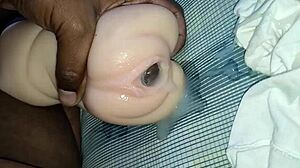 In this gay scene, placing it in the doll with care.