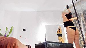 naughty milf sonya teases in black lingerie and gloves