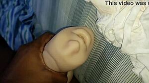 In this gay scene, placing it in the doll with care.