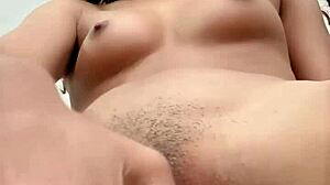 Petite beauty drills her pussy with dildo close-up